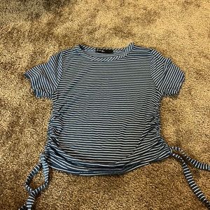 Blue and White stripped short sleeve t-shirt with ties on both sides. Size M.